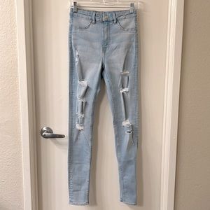 High-waisted distressed skinny jeans